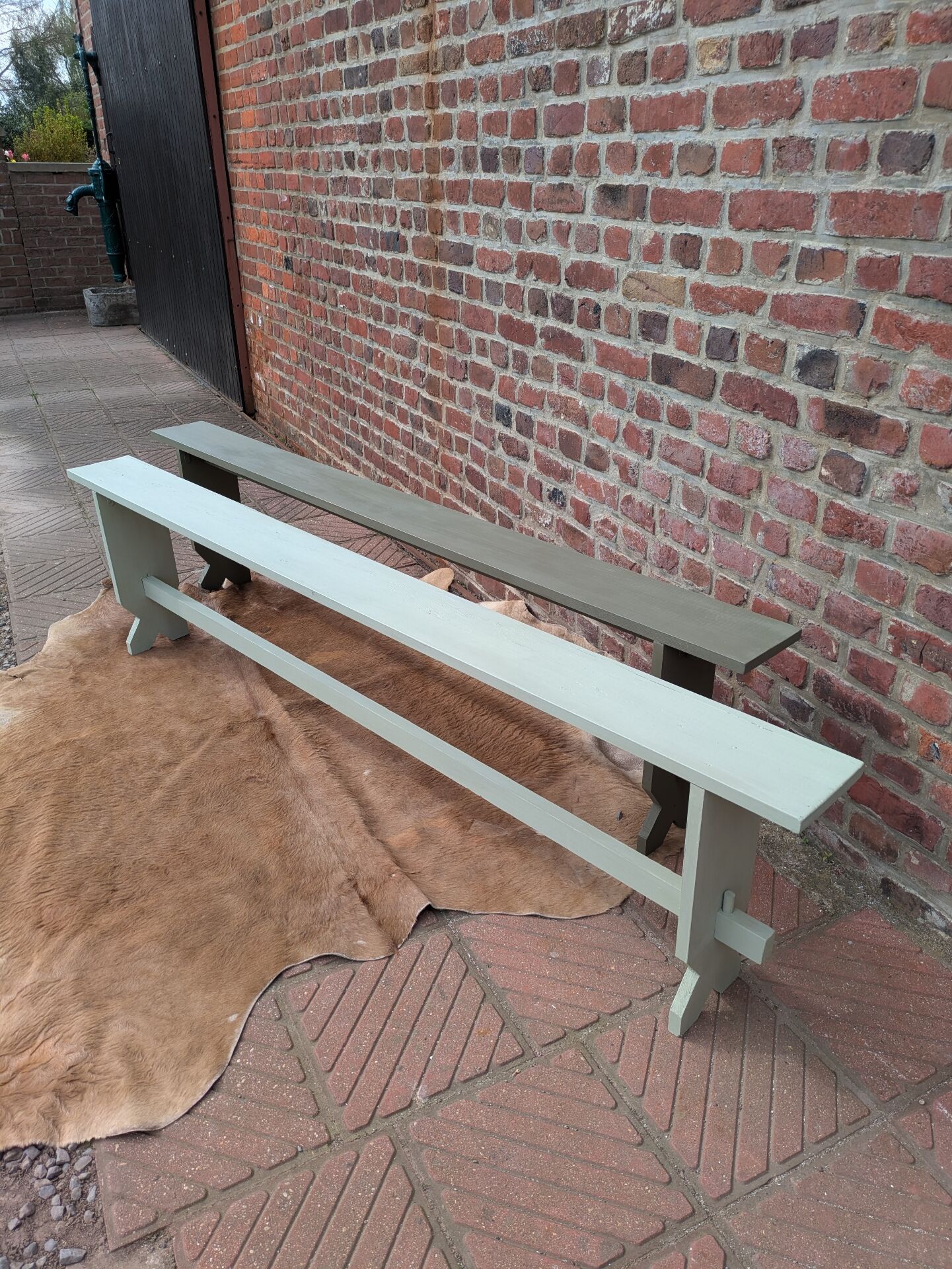 Pair of patinated benches