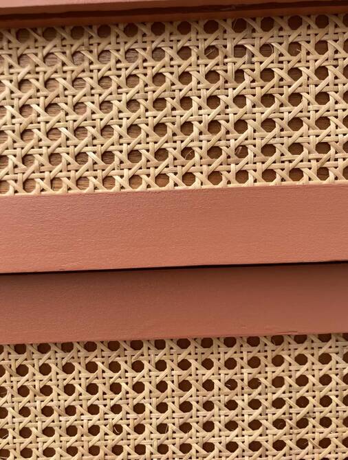 Restored vintage rattan chest of drawers in terracotta shade 1960