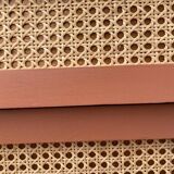 Restored vintage rattan chest of drawers in terracotta shade 1960