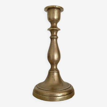 Bronze candle holder and golden candle