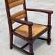 Armchair in stained oak and straw, French work from 1950.