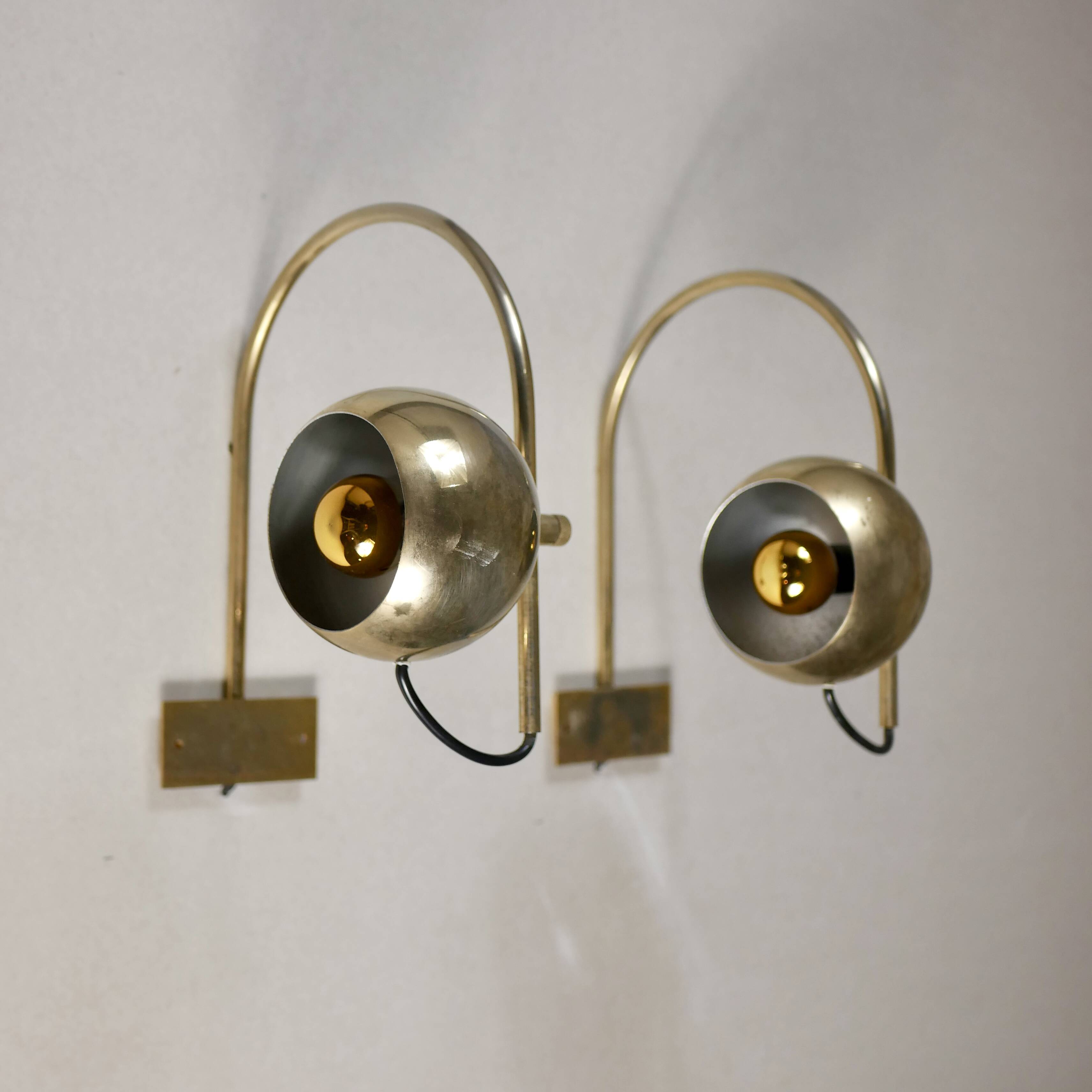 Pair of brass eyeball wall lights