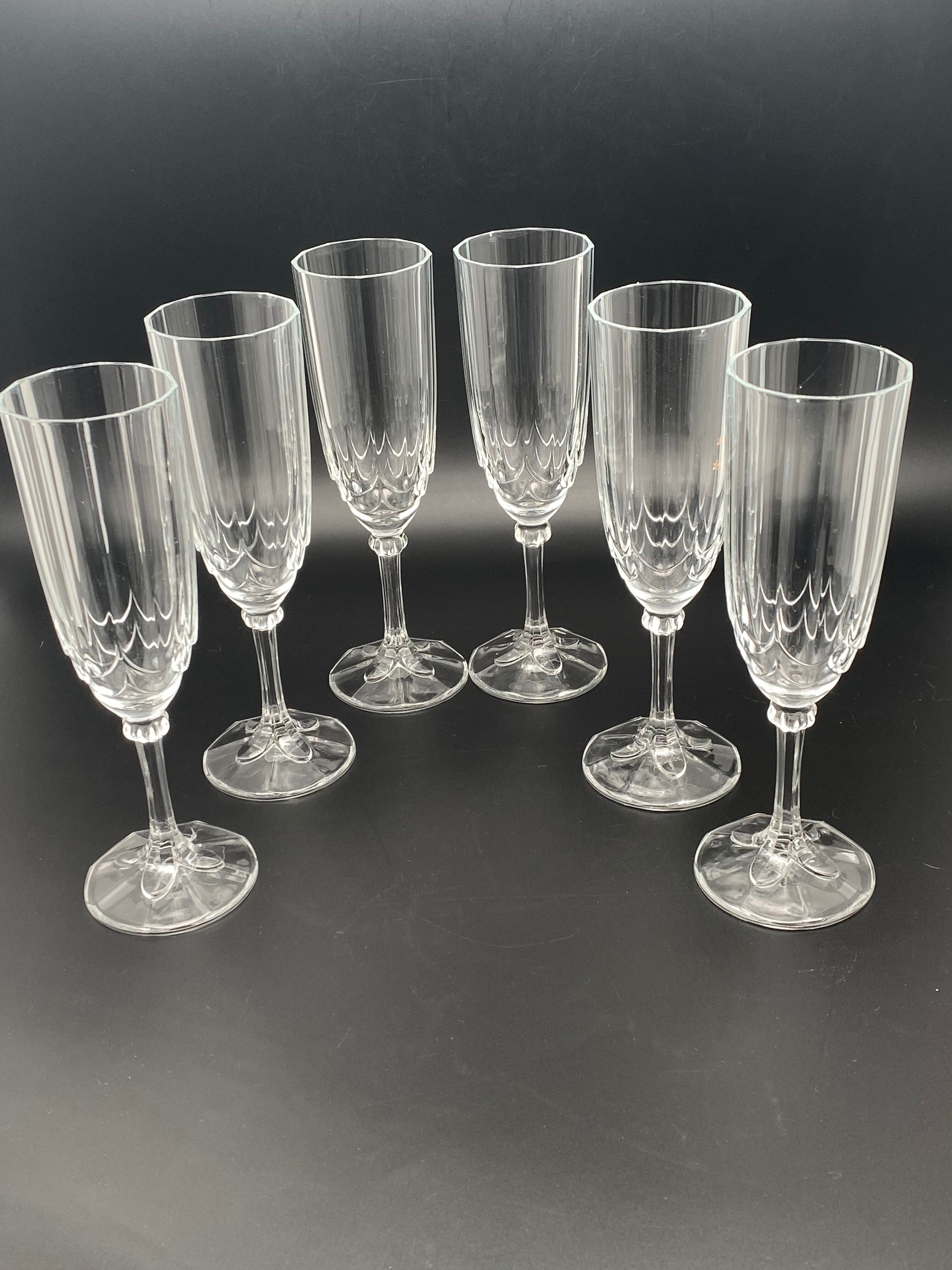Champagne flutes in worked glass