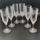 Champagne flutes in worked glass