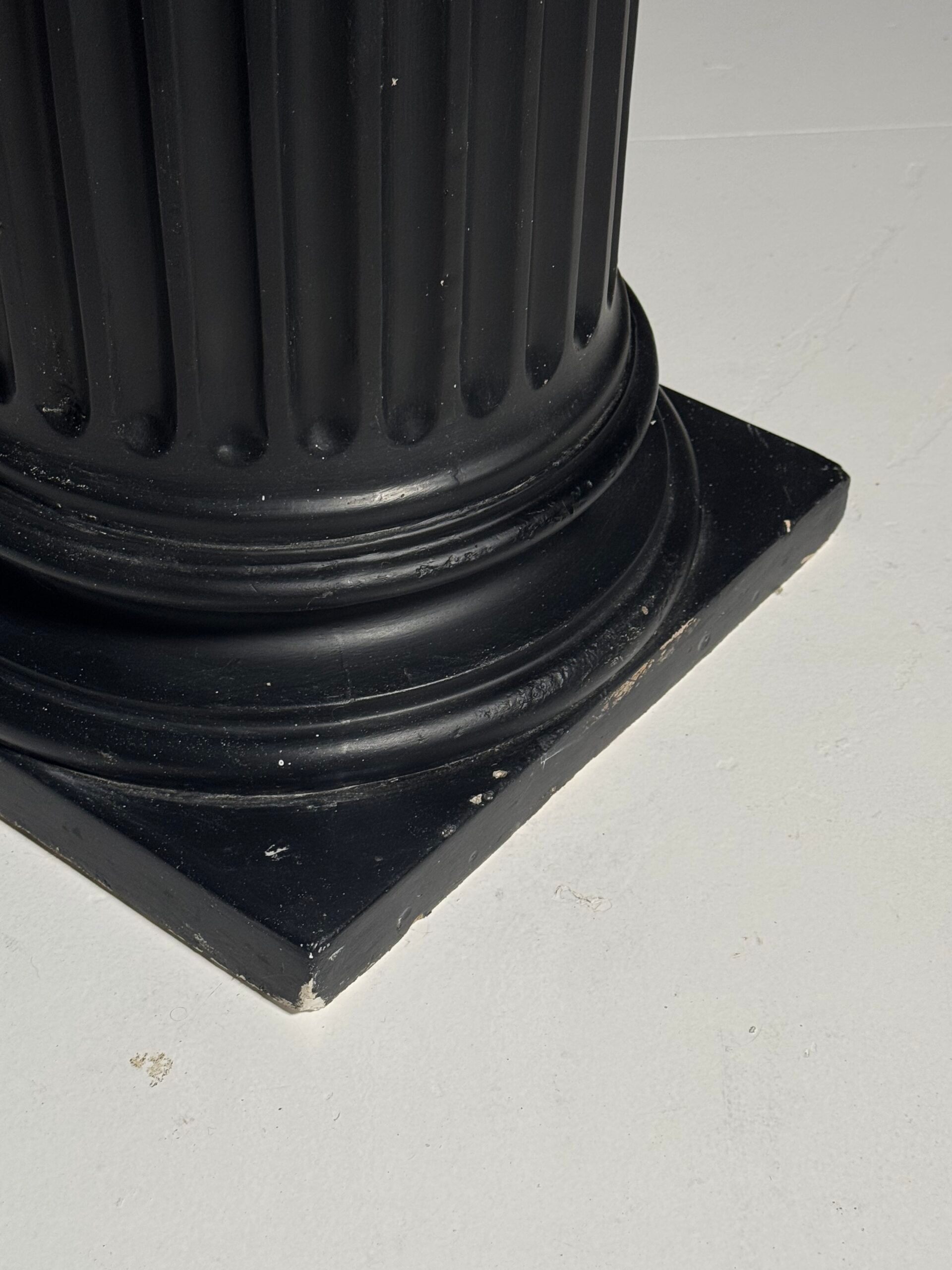 Neoclassical black plaster column