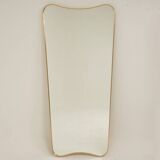 Patinated brass-framed mirror. 1980s/90s.