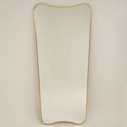 Patinated brass-framed mirror. 1980s/90s.