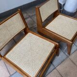 Pair of teak and canning armchairs
