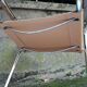 Fauteuil Cantilever en cuir couleur pêche