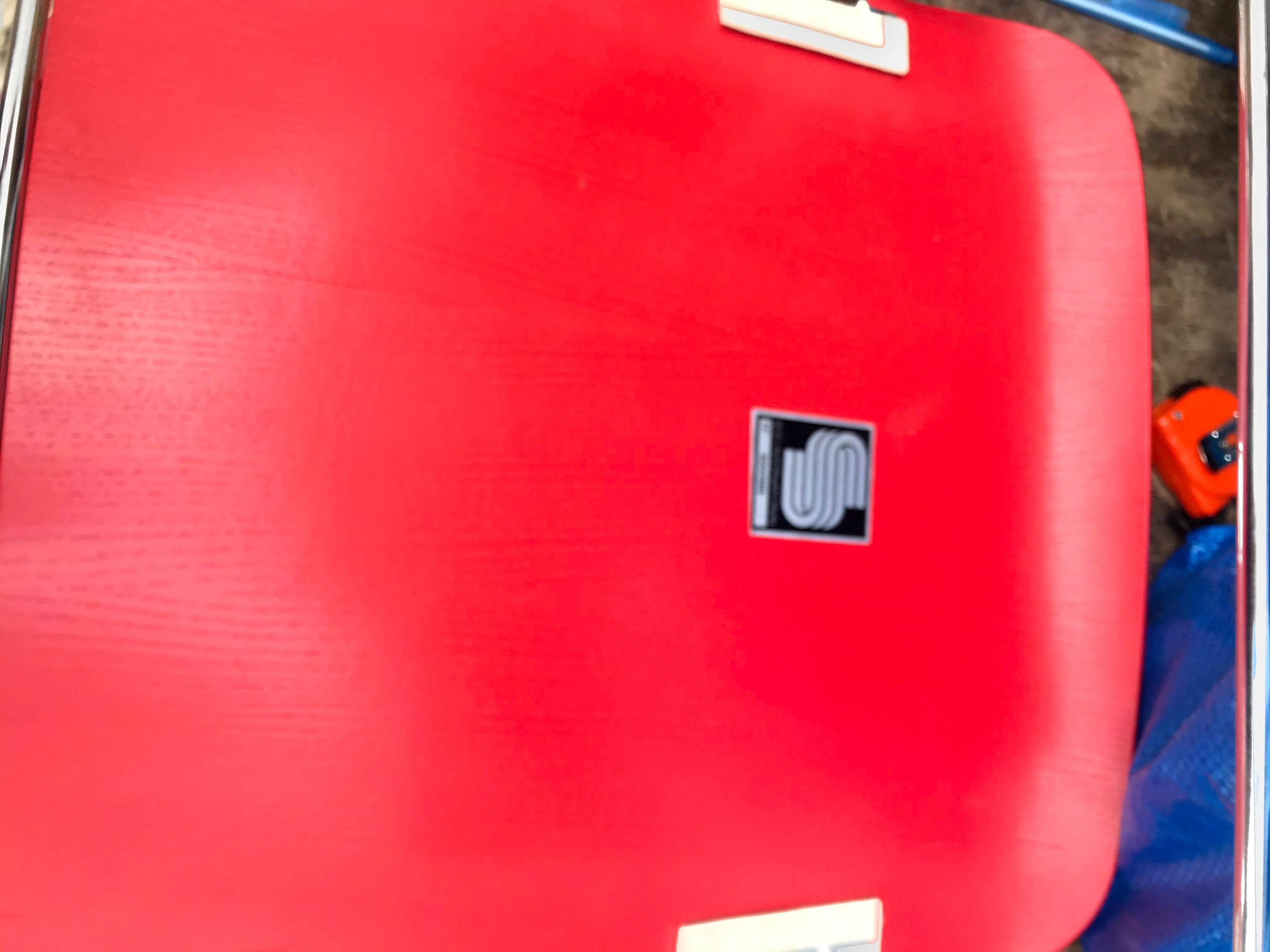 David Rowland red chair for Seid International Design