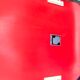 David Rowland red chair for Seid International Design