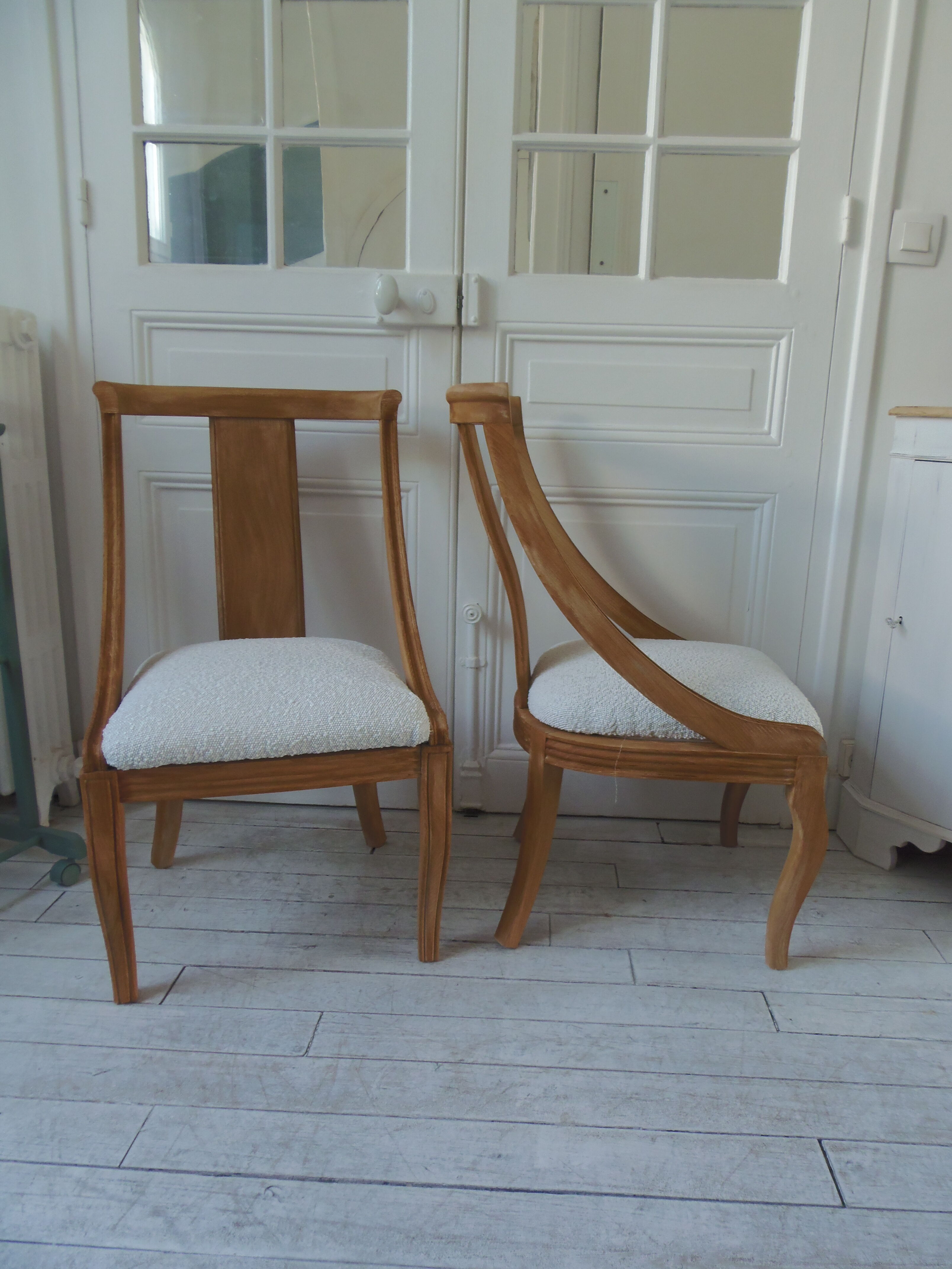 Pair of Gondola heaters, upholstered with a cream curl fabric