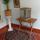 18th century showcase has three mobile windows