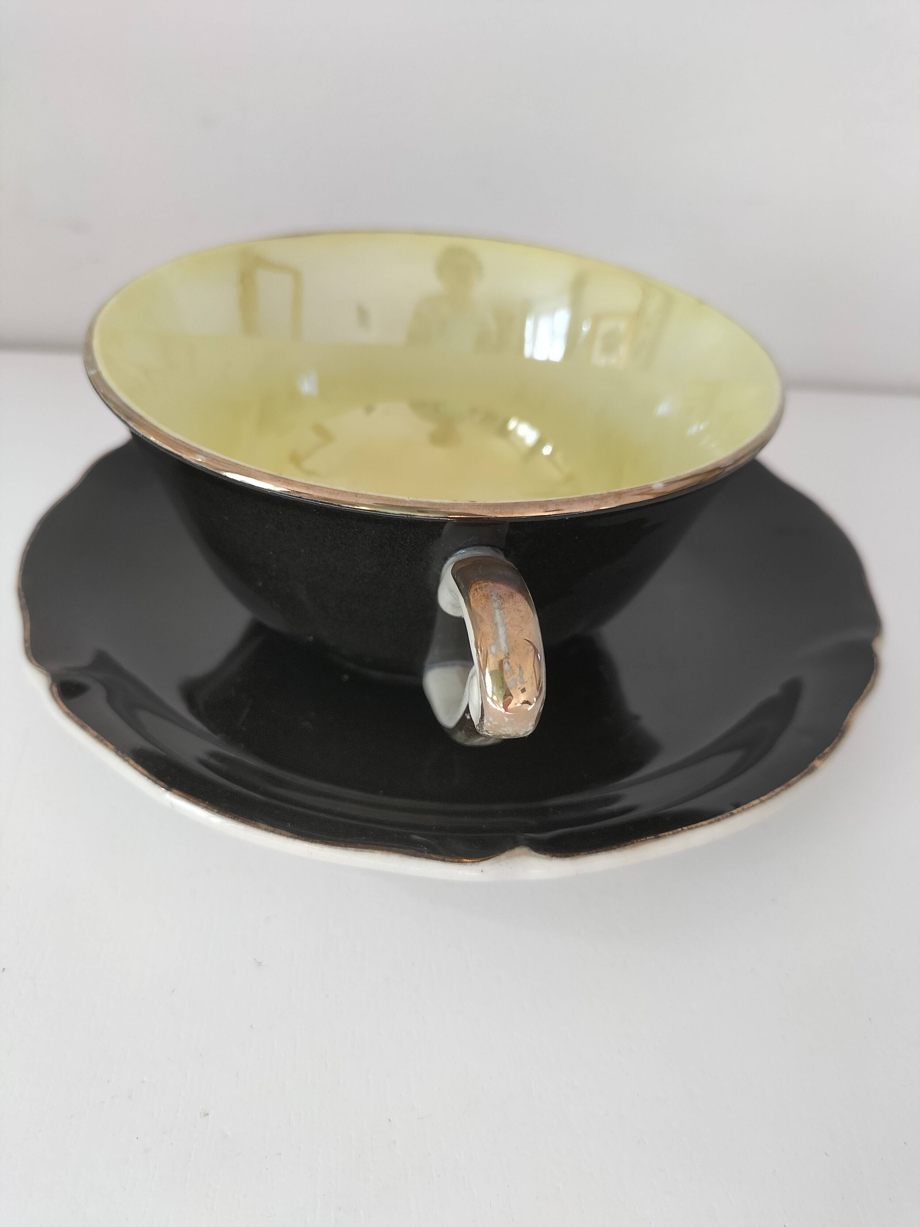 Large black, yellow iridescent and white Art Deco Saint-Amand cup.