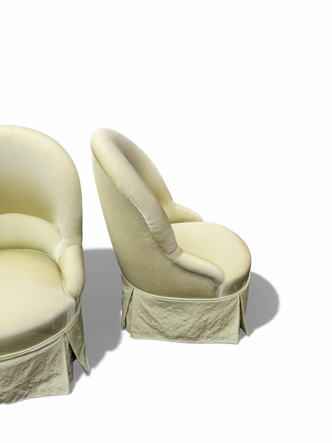 Paire de fauteuils crapaud tapissés pastel vert pomme