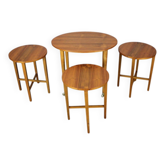 Restored Danish folding teak table with three nesting chairs by Poul Hundevad