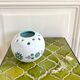 Vase boule pique fleurs