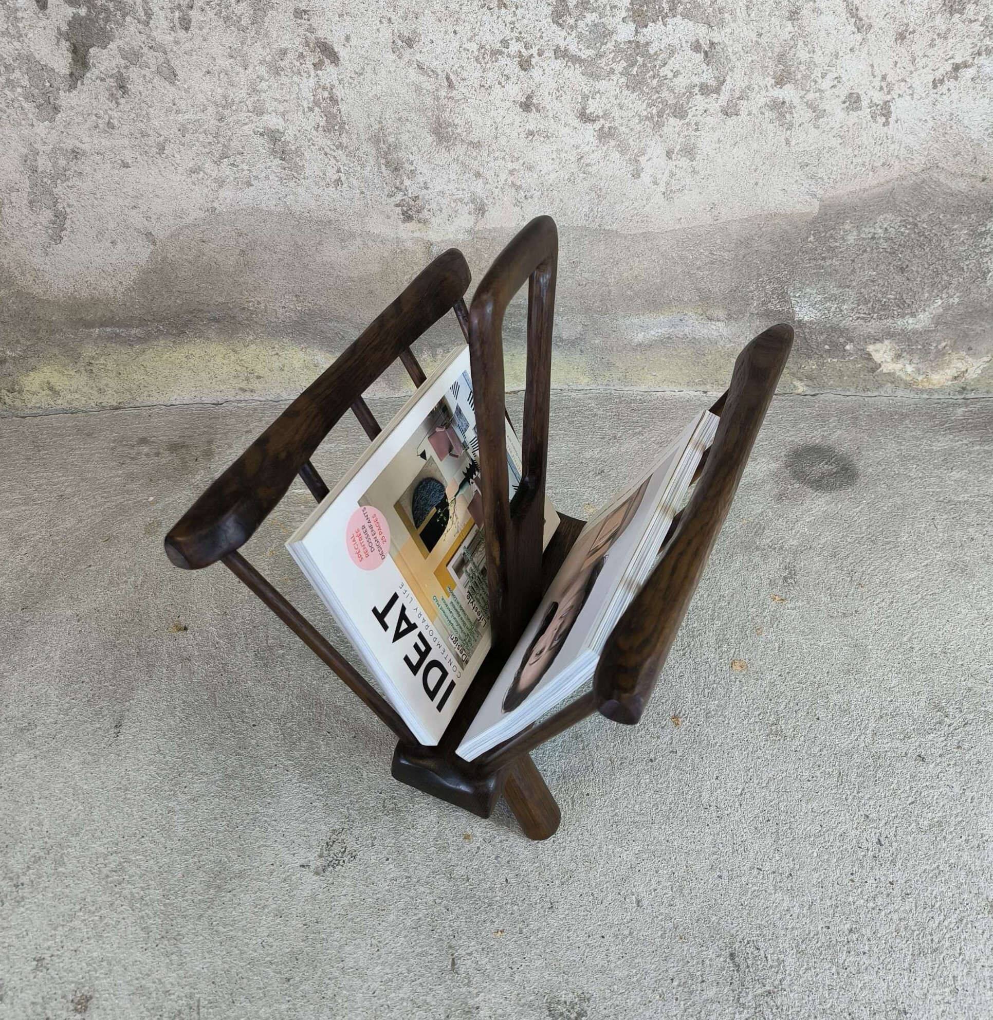 Vintage magazine rack in solid wood.