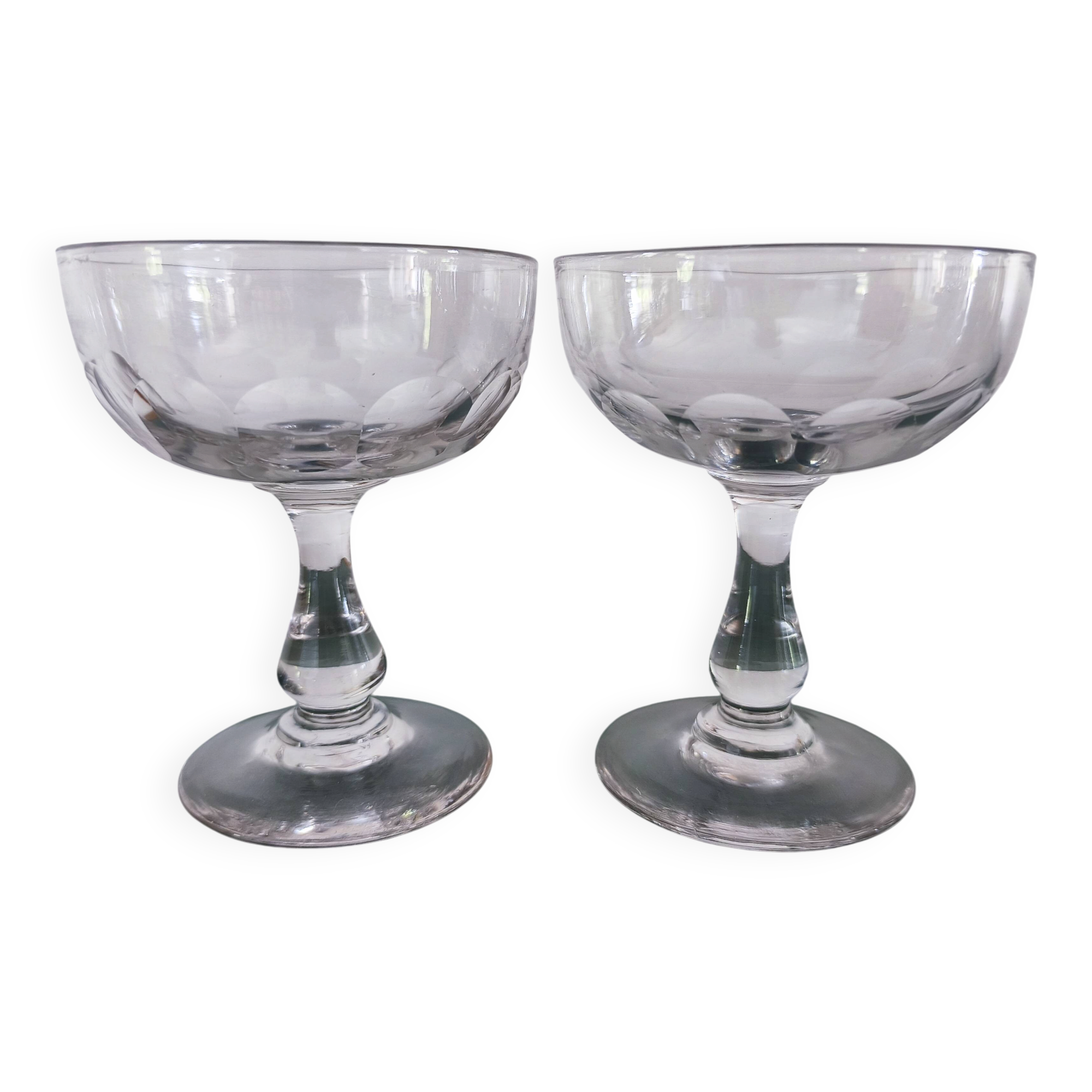 Set of 2 Baccarat crystal champagne glasses.