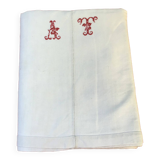 Sheet marked AT in red cross stitch