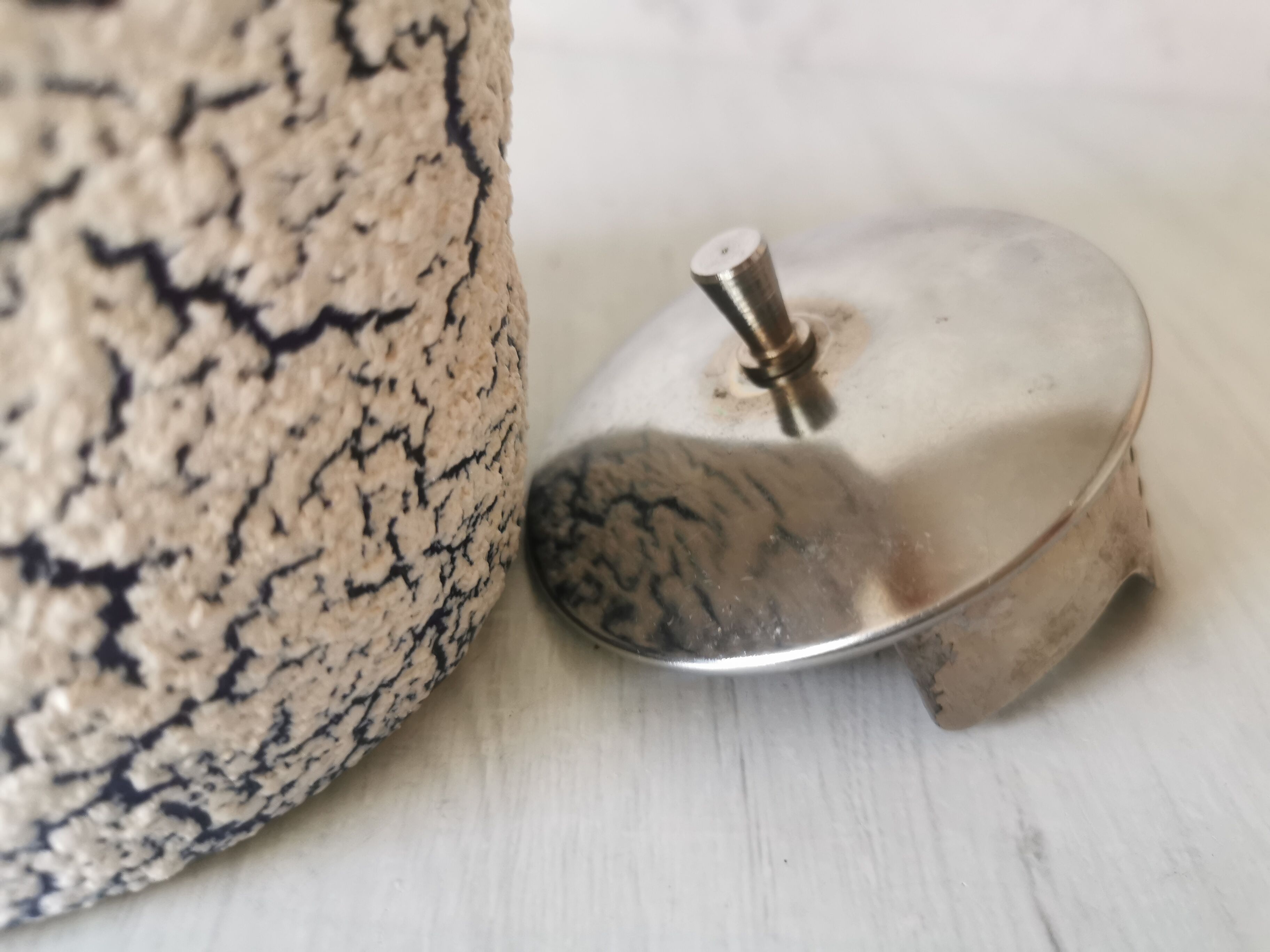 Cracked and enamelled ceramic teapot