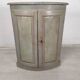 Rustic patinated corner cupboard