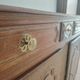Two low antique buffets in carved solid oak with rosettes.