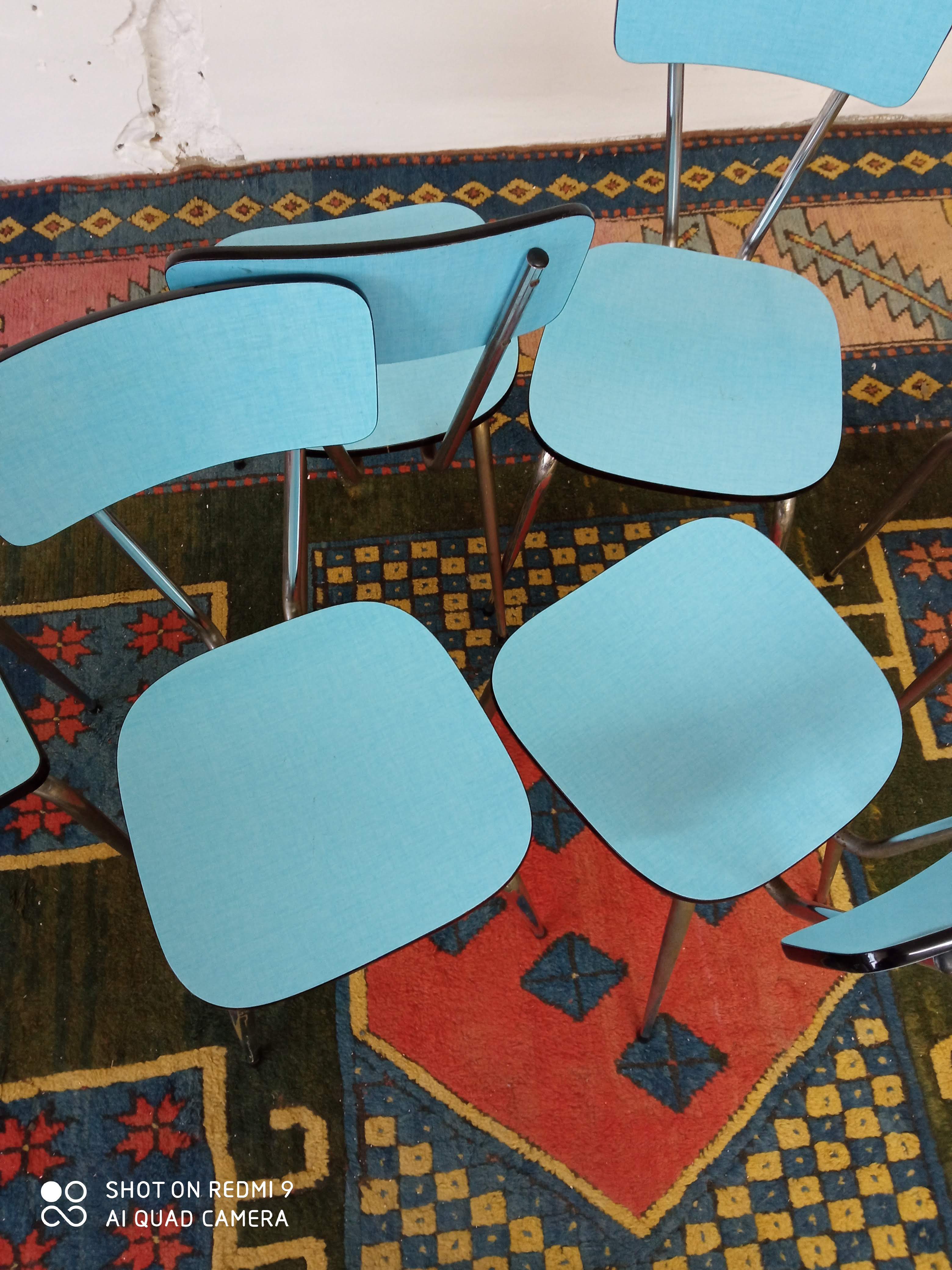 Blue formica chairs and stools
