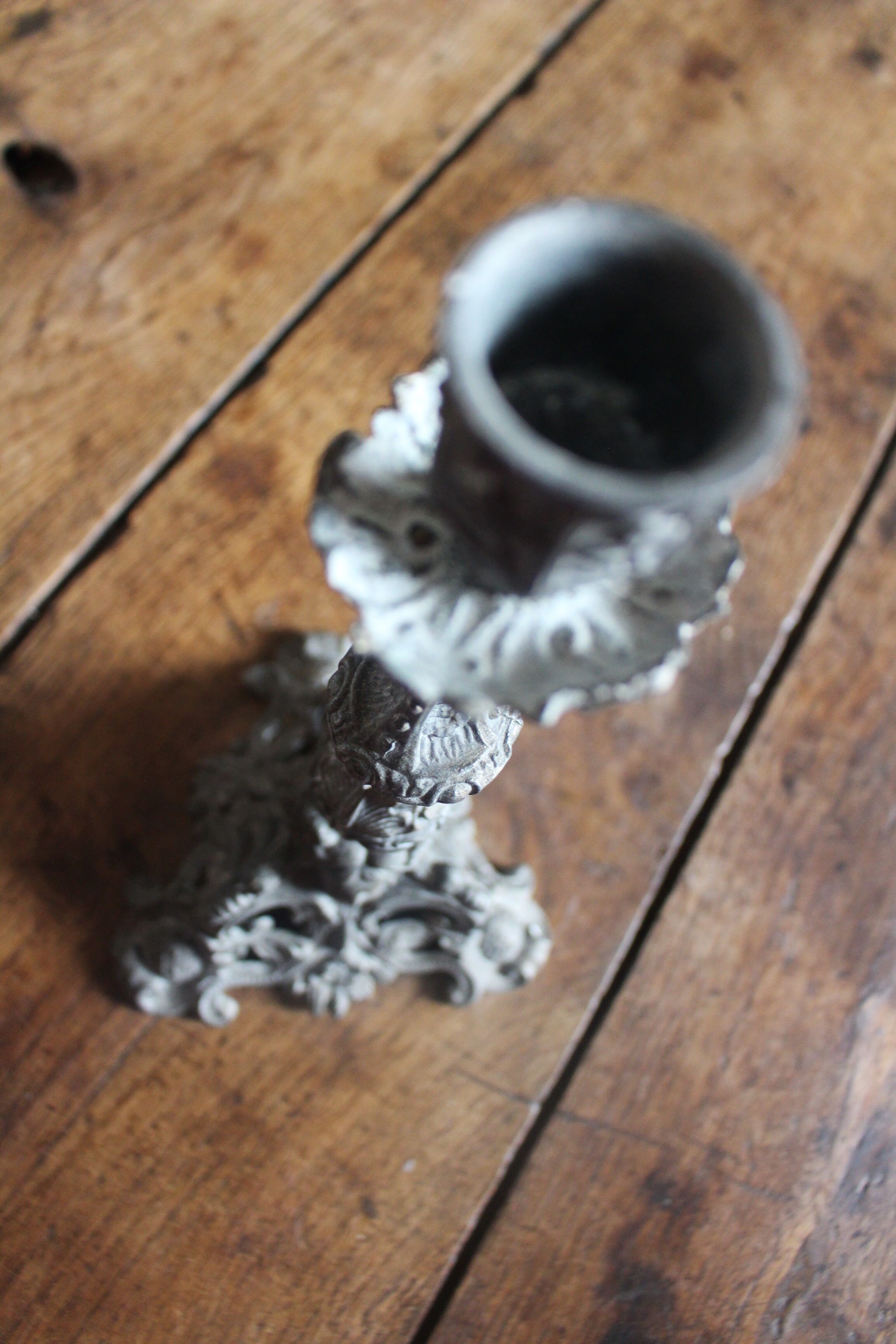 Grey cherub church torch candlestick