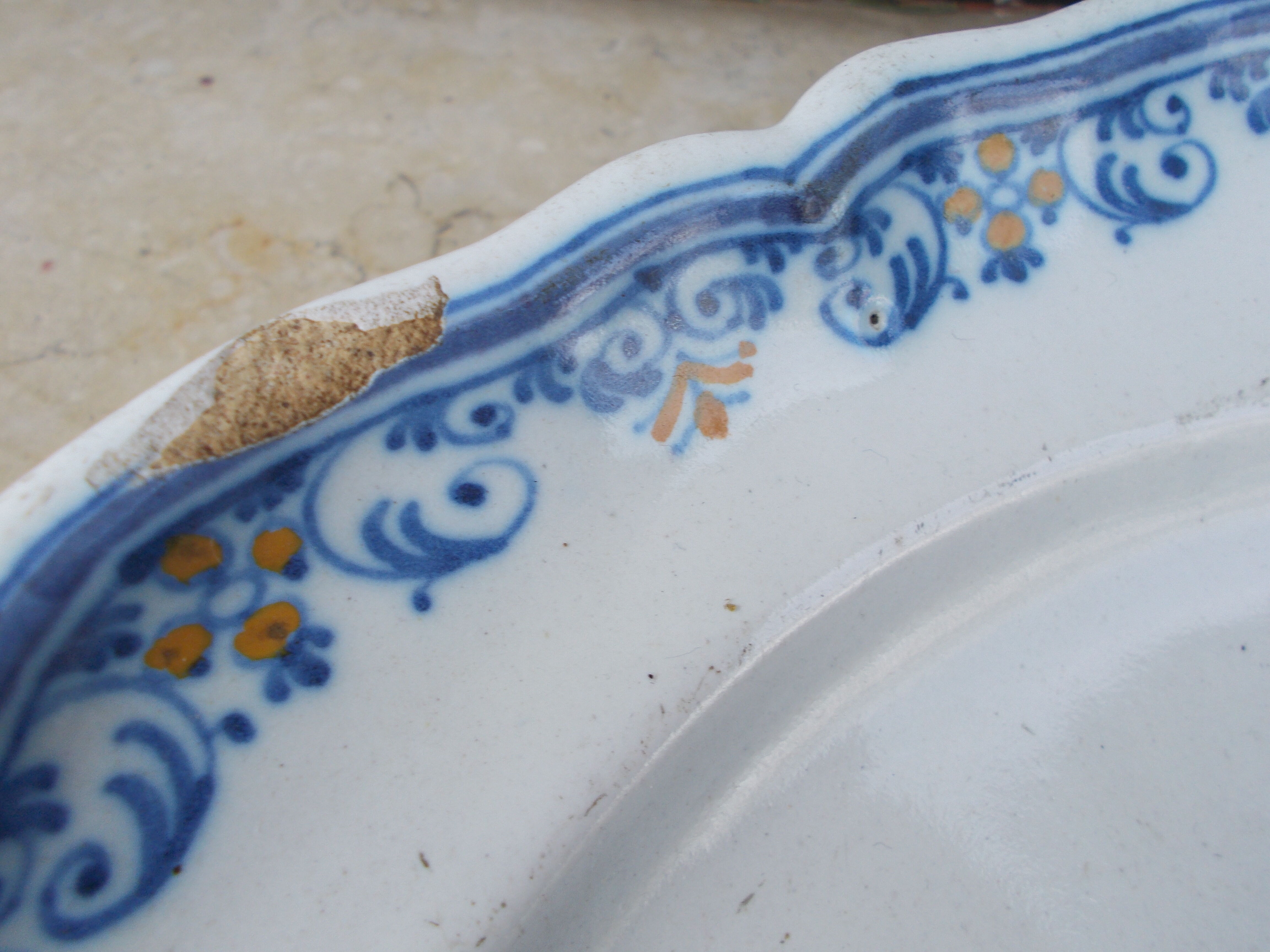 Old faience plate of Moustiers