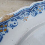 Old faience plate of Moustiers
