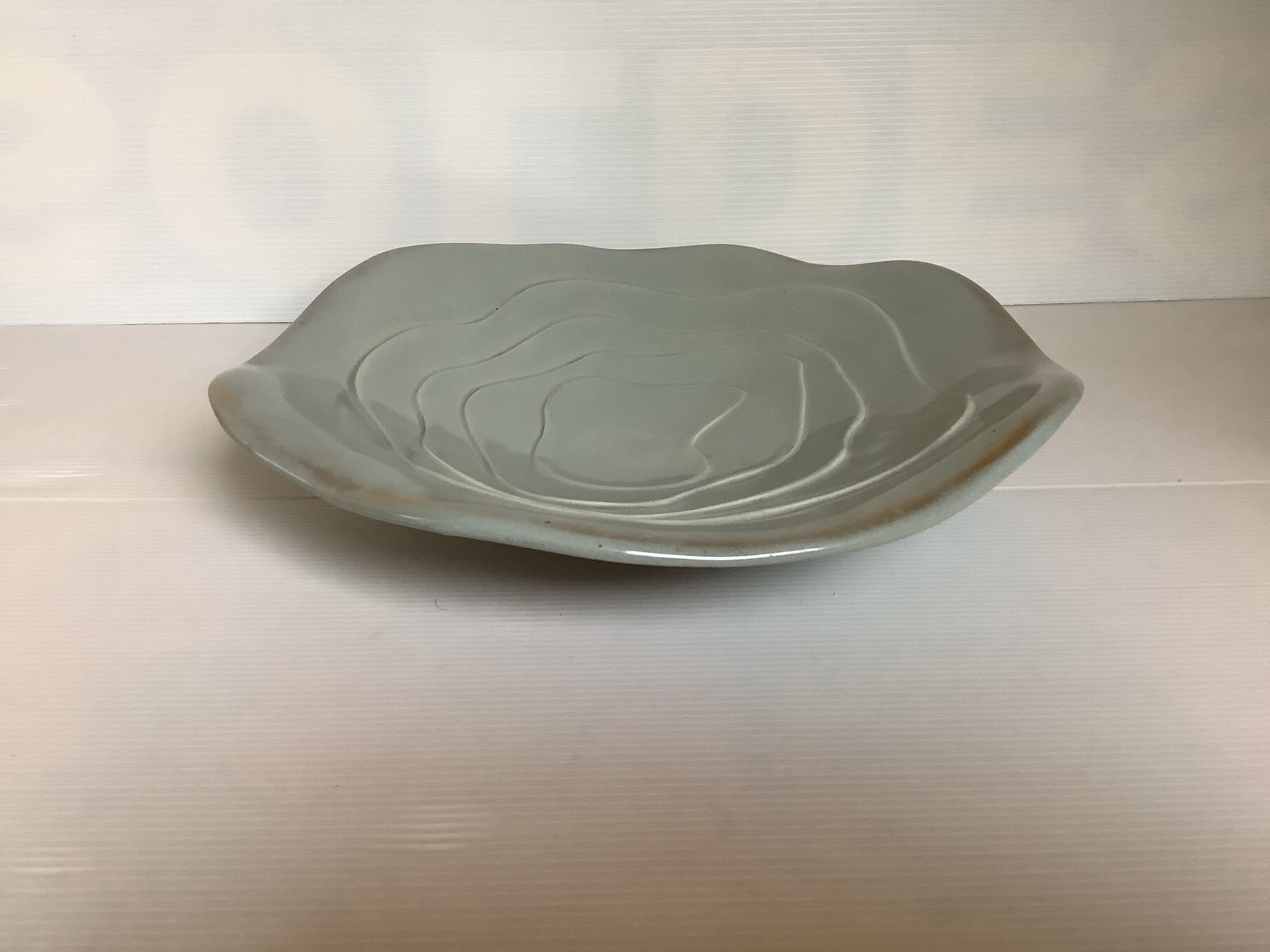 Grey-green ceramic cup