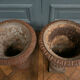 Pair of cast iron garden vases of Medici shape foot shower early twentieth century