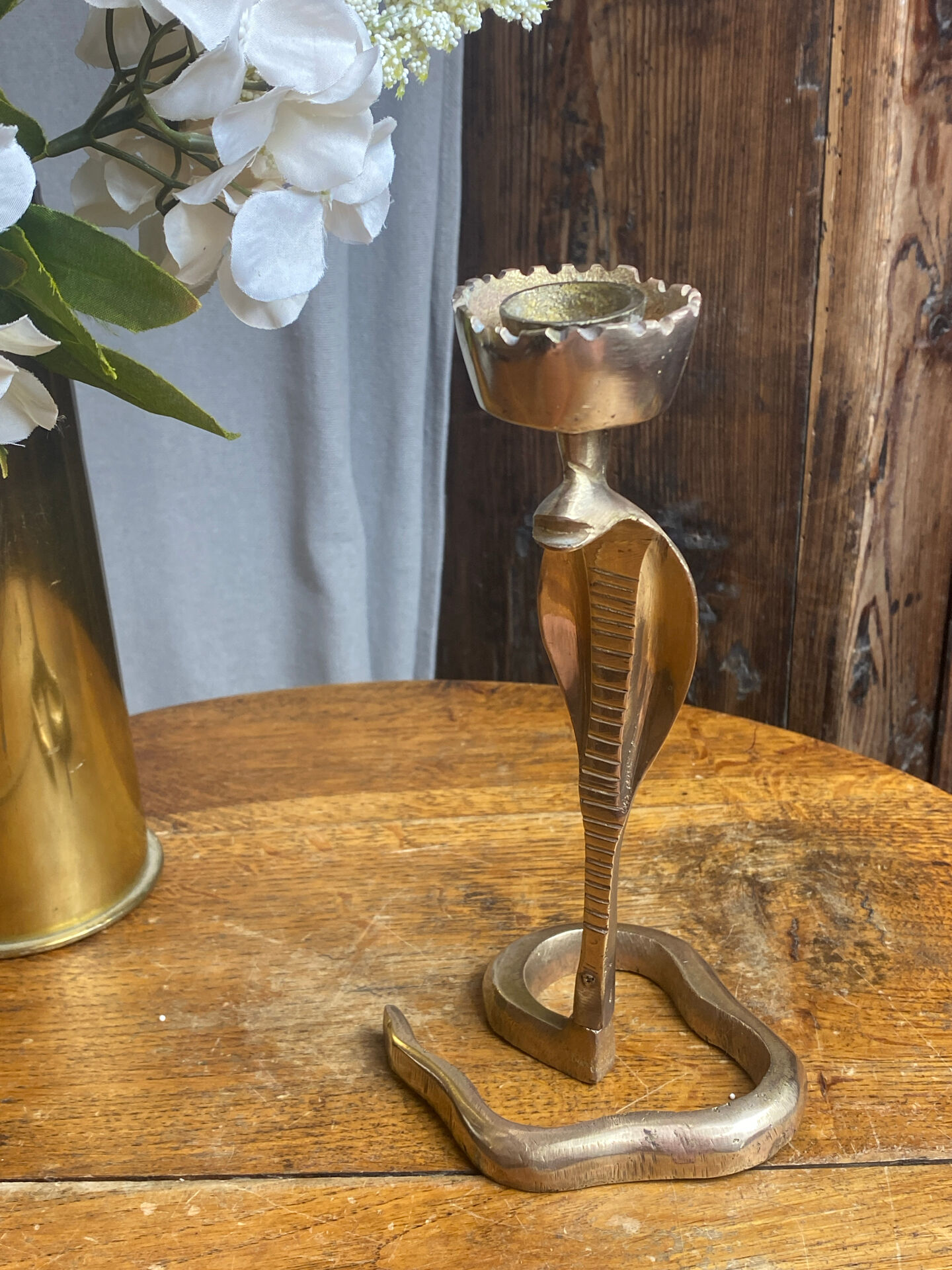 Cobra candlestick in brass