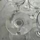 Set of seven blown glass stemmed glasses.