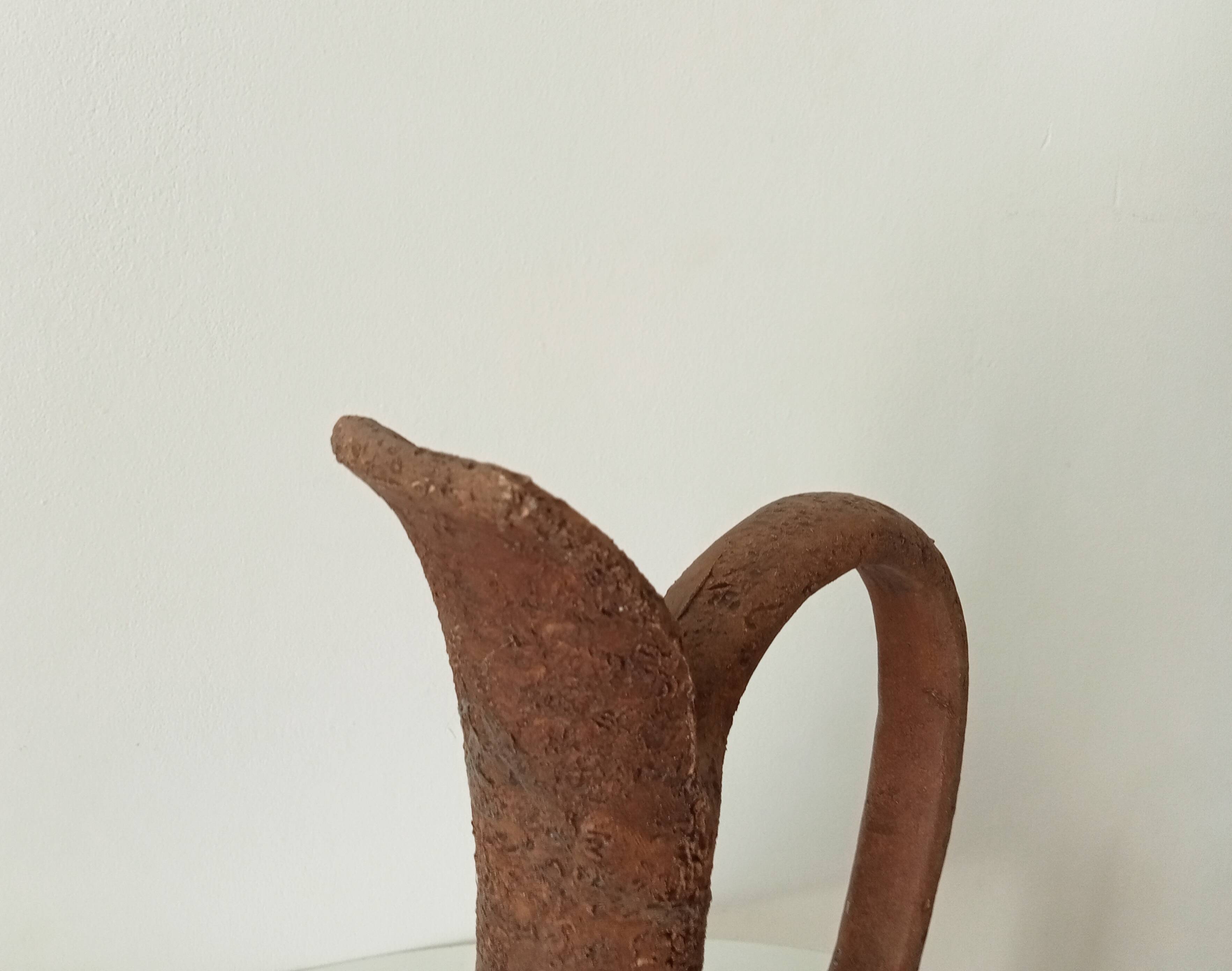 Cruche ancienne en terre cuite
