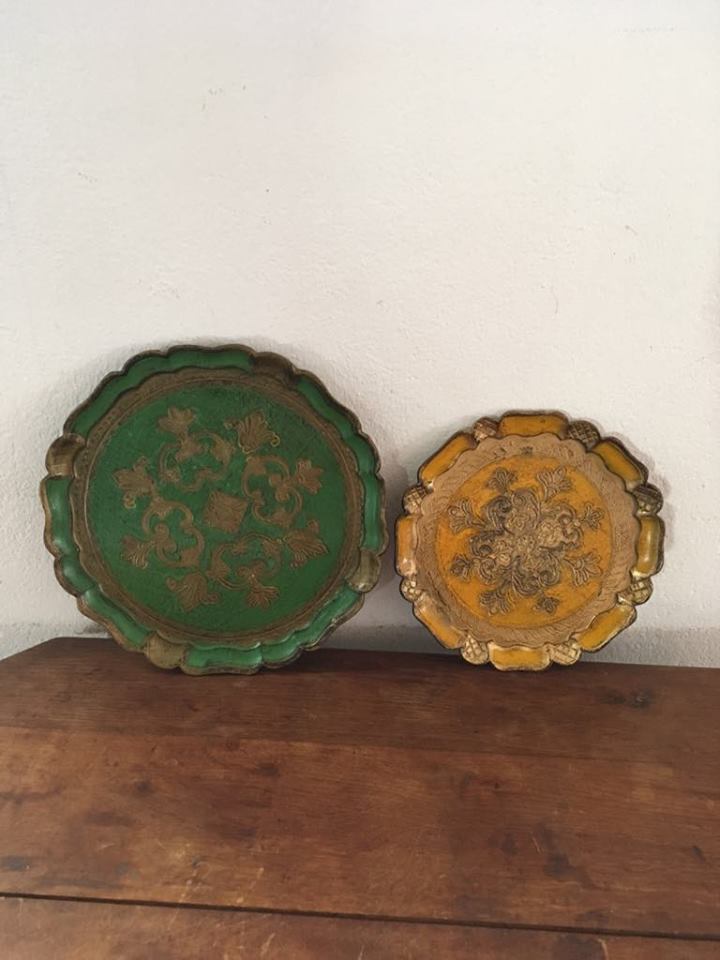 Two Florentine round table tops.