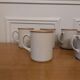 Six ceramic mugs