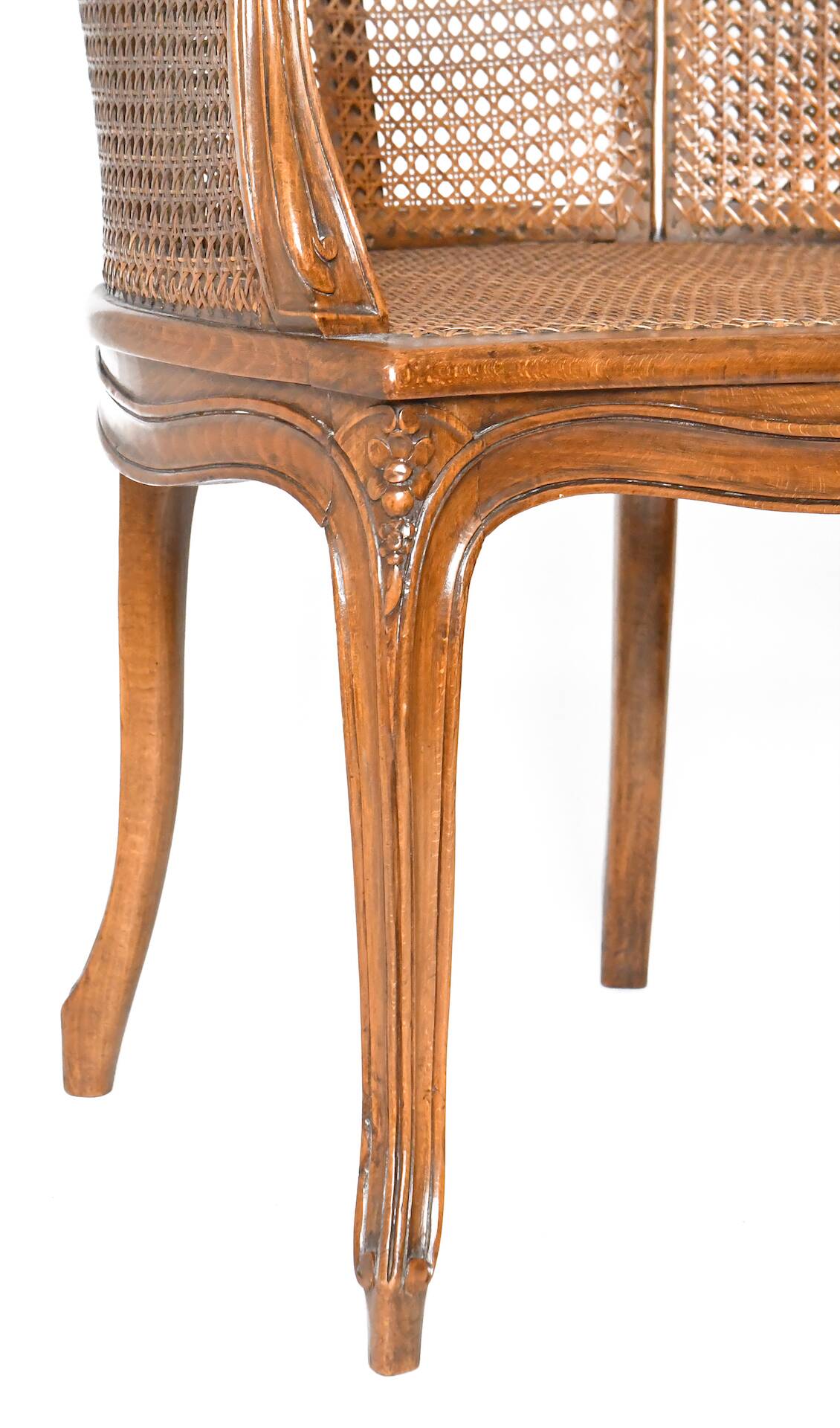 Louis XV style caned bergère armchair