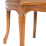 Louis XV style caned bergère armchair