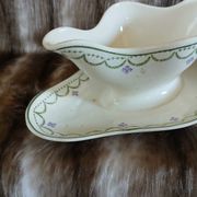 Antique sauce boat in Longwy ironstone.