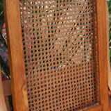 Cane folding armchair in solid wood