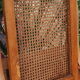 Fauteuil pliant canné en bois massif