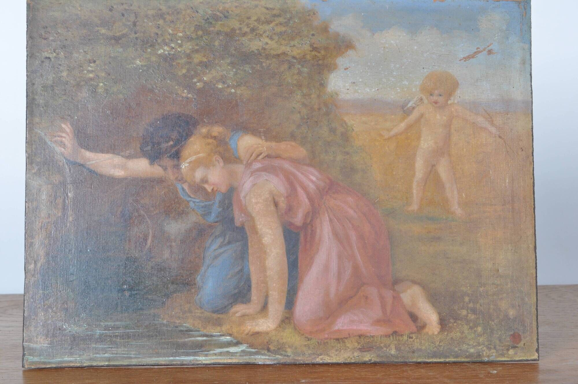 Painting on wood "Cupid and a couple at the fountain".
