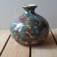 Single-flower vase in glazed Limoges porcelain
