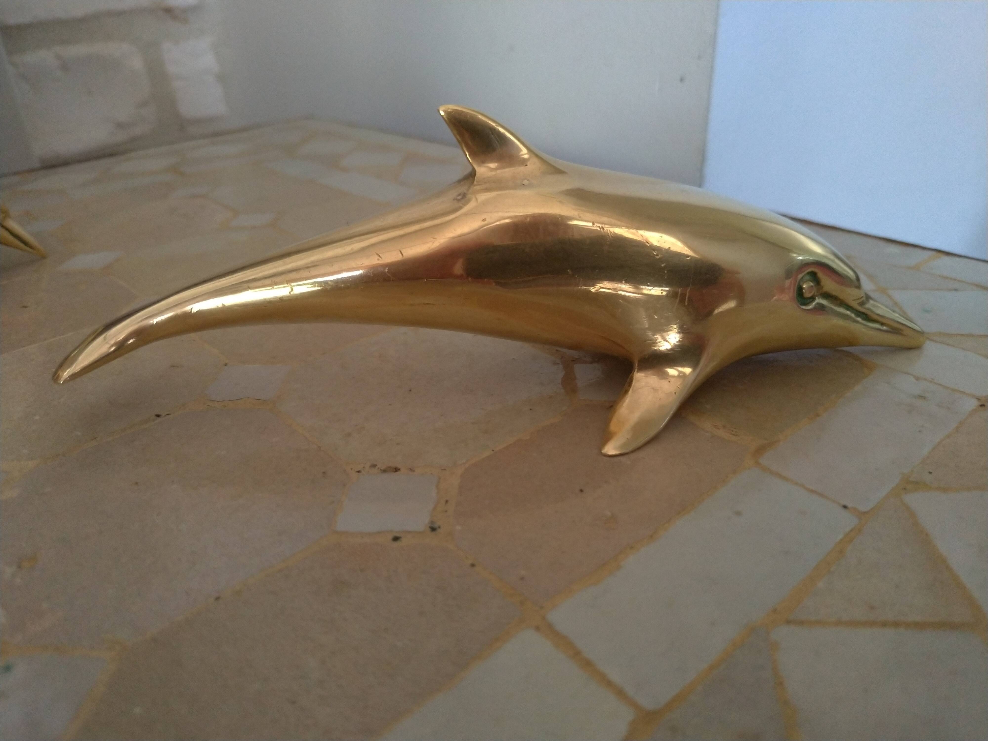 Brass dolphins