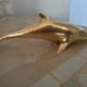 Brass dolphins