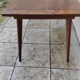 Vintage oak table with tapered legs.