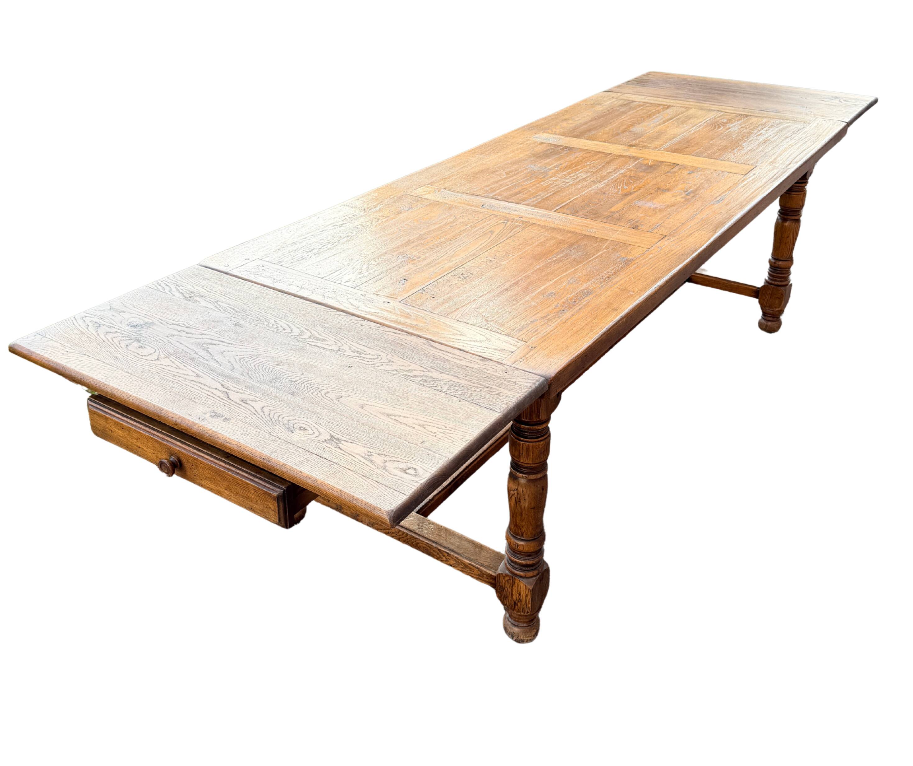 Large farmhouse table made of solid wood.