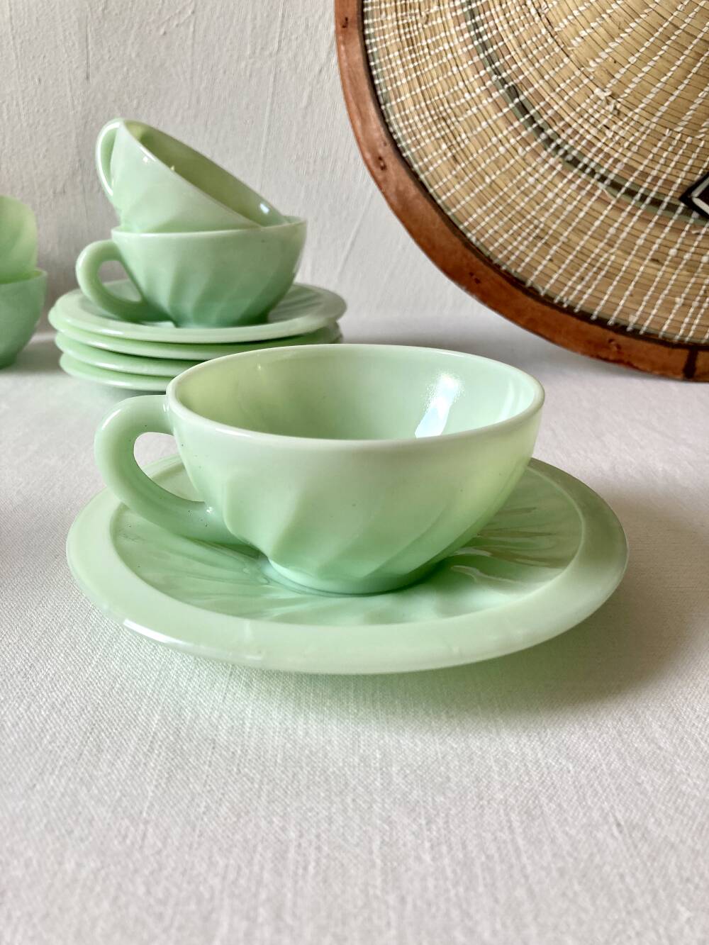 Pressed glass cups and saucers, 1950s